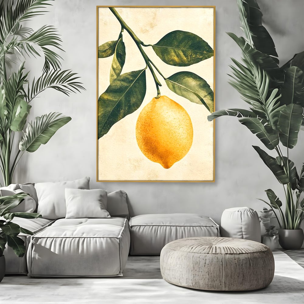 Tablou canvas cu ilustratie botanica cu lamaie si frunze, in rama de aluminiu auriu, pe perete intr-un living